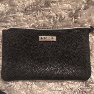 Never before used makeup pouch